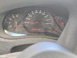a close up of a car dashboard with a speedometer