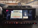 a picture of a car dashboard with a camera mounted to it