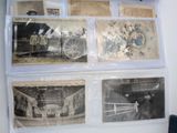 many old photos hanging on the wall of a room