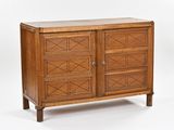 an image of a wooden cabinet with drawers and doors