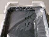 a box that has a laptop in it on a table