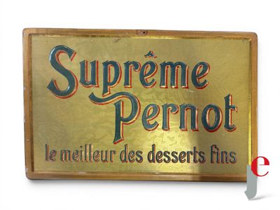 gold plated sign with the words supreme pernot on it