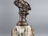 an image of a statue of a woman sitting on top of a marble base