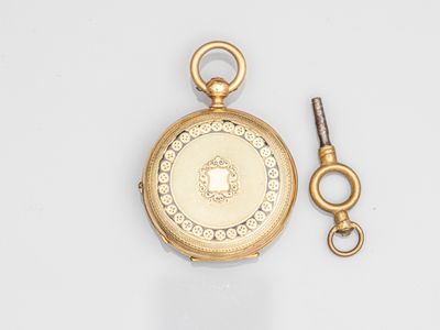 an image of a gold pocket watch with a chain attached to it