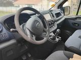 a car with a paper bag in the passenger seat