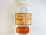 a bottle of medicine with a label on it