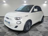 an image of a white smart car in a showroom