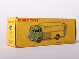 boxed box of dinky toys with a green and yellow truck