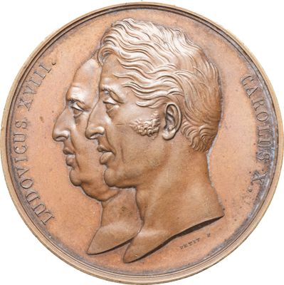 une image représentant une médaille de bronze sur laquelle figurent deux têtes, celle d'un homme et celle d'une femme