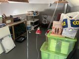 an image of a room with a lot of stuff in it