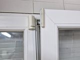 a close up of a window with blinds on it