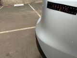 a sticker on the back of a car that says vauto