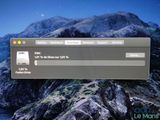 an image of a computer screen with a mountain in the background