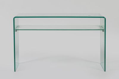 a clear glass console table with a glass shelf on top