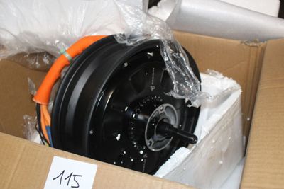 a box with a black wheel inside of it