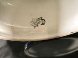 a white plate with a picture of a horse on it