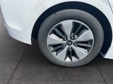 a close up view of a car ' s tire on the pavement