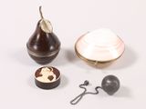 a picture of a pear and other items on a white surface