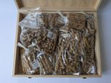 a wooden box filled with a bunch of cookies