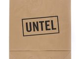 a brown paper bag with the word untel on it