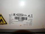 a label on the back of a refrigerator with a barcode on it
