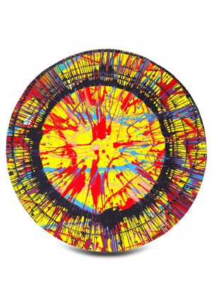 yellow, red, blue, and black abstract painting on a plate