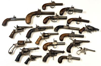 a lot of old guns that are on the table