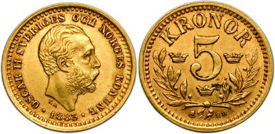 a close up of a gold coin with a crown on it