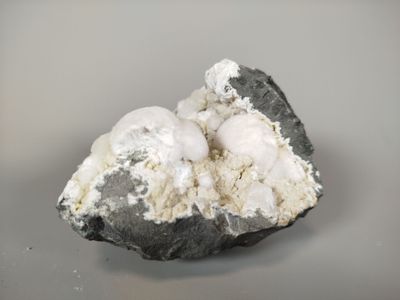 a rock with two eggs on top of it
