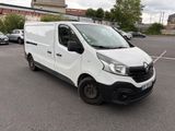 a white van that is parked in a parking lot