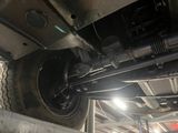 a close up view of a car underneath a vehicle