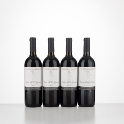three bottles of wine sitting on top of a table next to each other