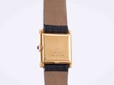 a close up of a wrist watch with a black strap