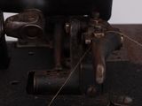 an old sewing machine that is sitting on a table