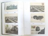 an open book with pictures of a city in it