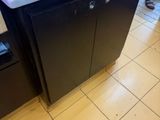 a microwave sitting on top of a counter in a kitchen
