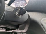 a close up of a steering wheel in a car
