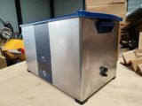 an image of a stainless steel chest freezer on a table