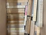 a box full of books that are sitting on the floor