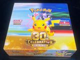 the box of the pokemon card game has been opened and ready to be played