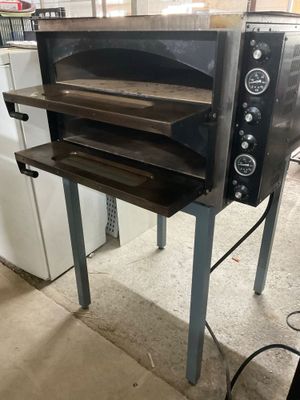 a large oven that is sitting in a room