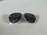 a pair of sunglasses sitting on top of a table