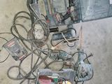 a lot of tools that are laying out on the floor