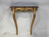 Console en bois mouluré, sculpté et doré, le plateau en marb…