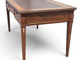 an image of a wooden table with a glass top on a white background