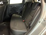the back seats of a car are empty and the passenger seat is empty