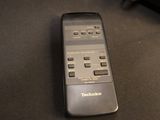 a remote control that is sitting on a table