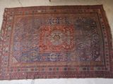 rug on the floor is very old and needs to be cleaned