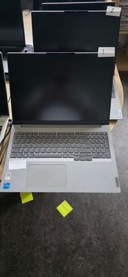 three laptops that are sitting on a table
