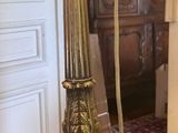 a lamp that is sitting on a table in a room